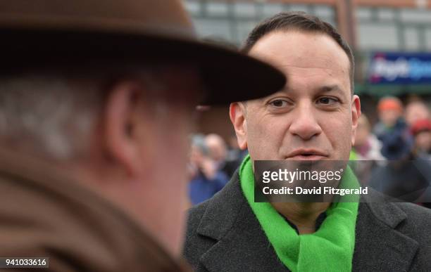 Meath , Ireland - 2 April 2018; An Taoiseach Leo Varadkar, T.D., speaks with trainer Willie Mullins following the Devenish Steeplechase on Day 2 of...