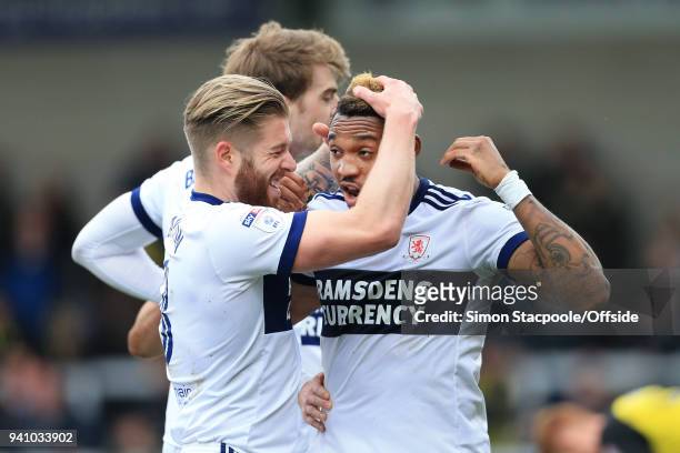 Britt Assombalonga of Boro celebrates with teammate Adam Clayton of Boro after scoring their 1st goal during the Sky Bet Championship match between...