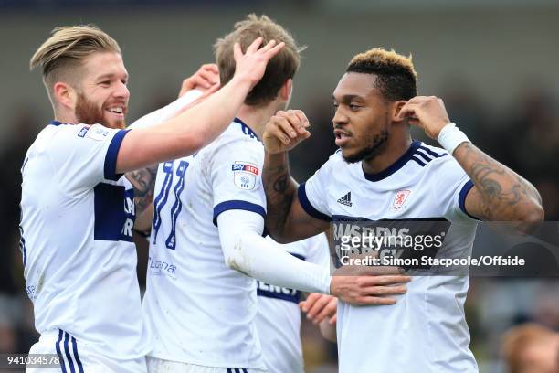 Britt Assombalonga of Boro celebrates with teammate Adam Clayton of Boro after scoring their 1st goal during the Sky Bet Championship match between...