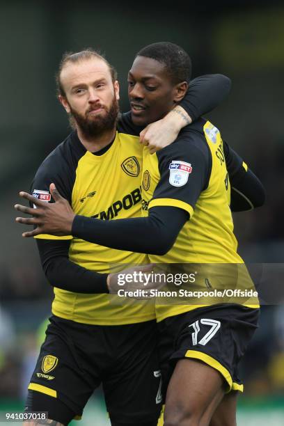 Marvin Sordell of Burton celebrates with teammate John Brayford of Burton after scoring their 1st goal during the Sky Bet Championship match between...