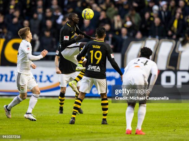 Enoch Kofi Adu of AIK heads the ball during an Allsvenskan match between AIK and Dalkurd FF at Friends arena on April 2, 2018 in Solna, Sweden.