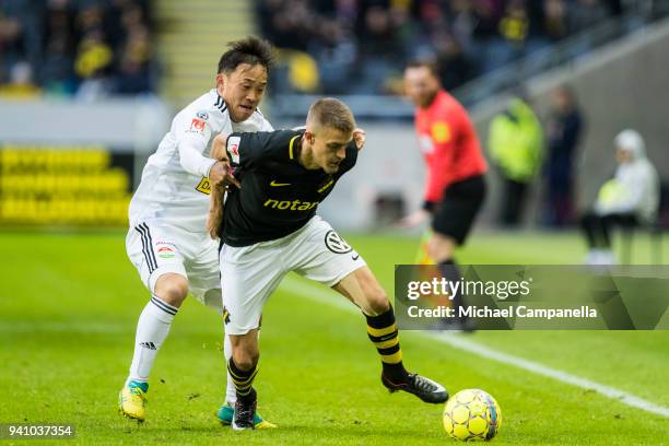 Rasmus Lindkvist of AIK in duel with Yukiya Sugita of Dalkurd FF during an Allsvenskan match between AIK and Dalkurd FF at Friends arena on April 2,...