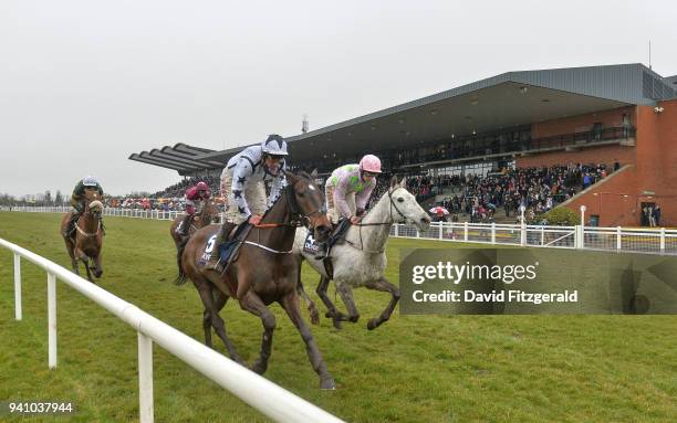 Meath , Ireland - 2 April 2018; Doctor Pheonix, with Davy Russell up, left, on their first time round during the Devenish Steeplechase on Day 2 of...