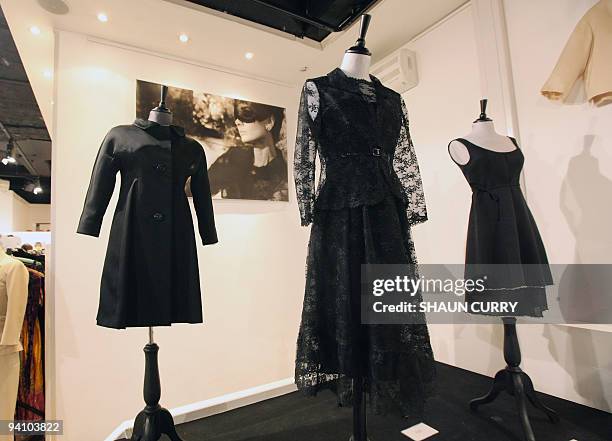 Black silk evening coat , a black chantilly lace cocktail dress worn in the 1966 film 'How to Steal a million' and a Givenchy haute couture black...