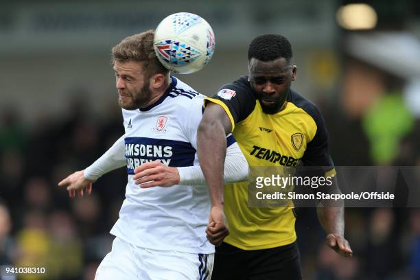 Martin Cranie of Boro battles with Hope Akpan of Burton during the Sky Bet Championship match between Burton Albion and Middlesbrough at the Pirelli...