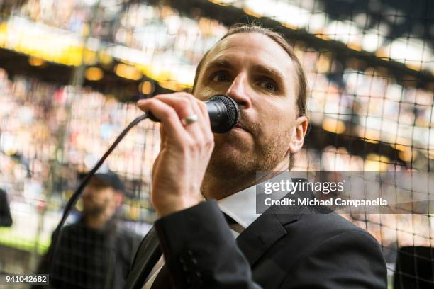 Former AIK captain Nils-Eric Johansson thanks the fans during his lap of honor before an Allsvenskan match between AIK and Dalkurd FF at Friends...