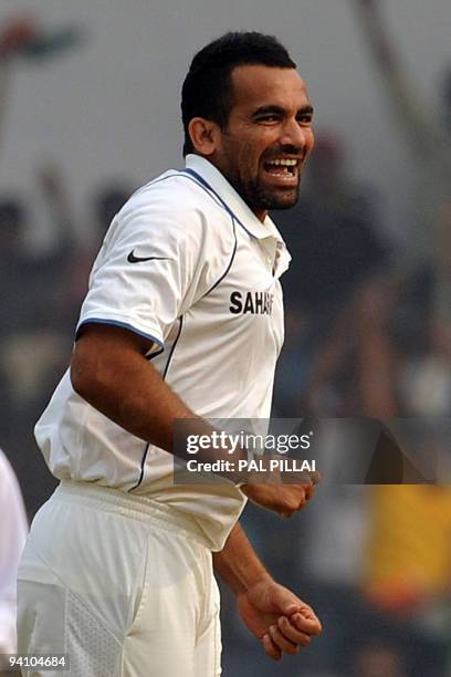 Indian cricketer Zaheer Khan celebrates taking the wicket of Sri Lanka's Kumara Sangakara on the final day of the third Test between India and Sri...