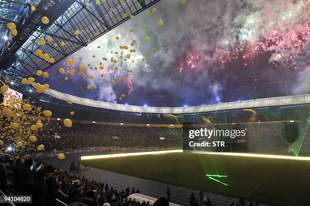 Fireworks illuminate the sky over the "Metalist" stadium during its inauguration ceremony in Kharkiv on December 5, 2009. Ukraine and Poland co-host...