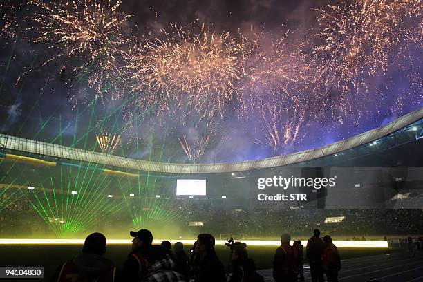 Fireworks illuminate the sky over the "Metalist" stadium during its inauguration ceremony in Kharkiv on December 5, 2009. Ukraine and Poland co-host...