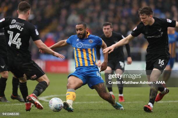 Stefan Payne of Shrewsbury Town and Rob Dickie of Oxford United during the Sky Bet League One match between Shrewsbury Town and Oxford United at New...