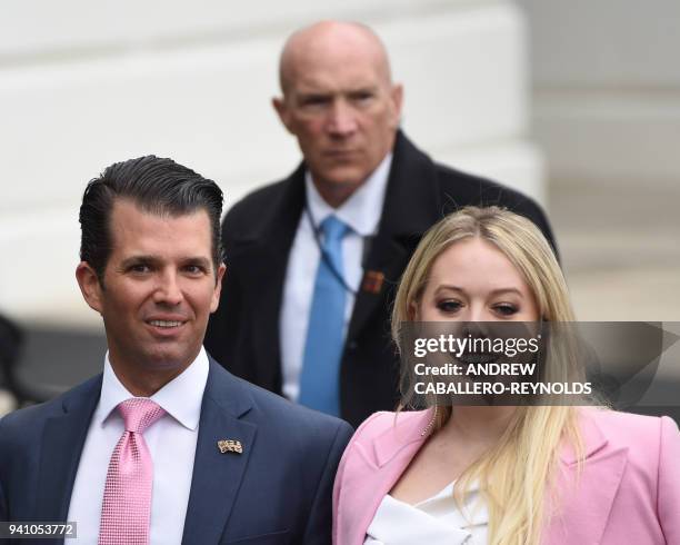 Donald Trump, Jr., and Tiffany Trump leave the South Lawn after Easter celebrations at the White House in Washington, DC, on April 2, 2018. / AFP...