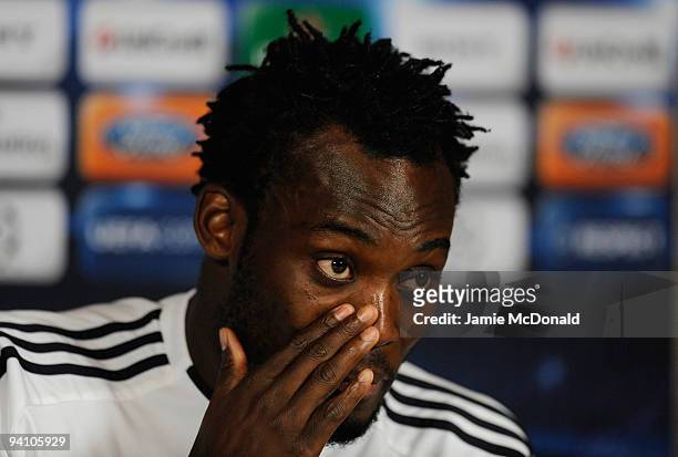 Michael Essien of Chelsea talks to the media during a Chelsea Training & Press Conference, ahead of their Champions League Group D match against...