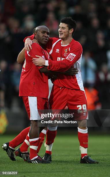 Barry Hayles of Cheltenham Town is congratulated by team mate Ben Marshall after scoring his sides first goal during the Coca Cola League Two Match...