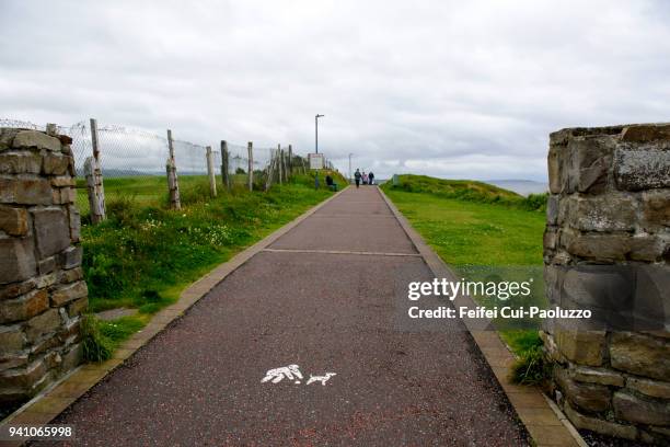 footpath on the seaside of bundoran, county donegal, ireland - bundoran ireland stock pictures, royalty-free photos & images