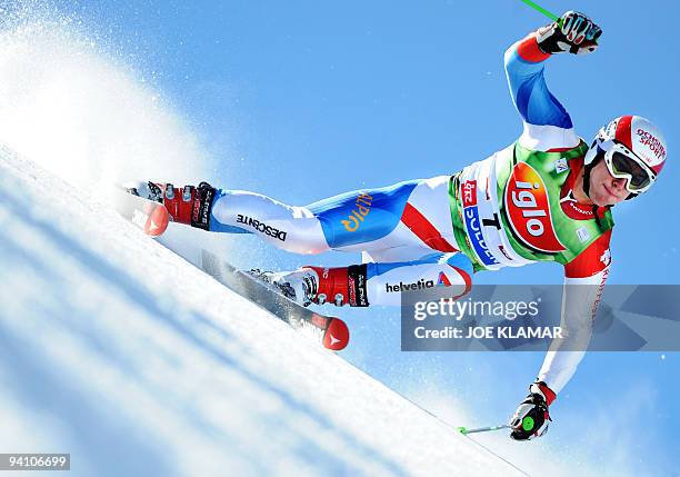 Switzerland's Carlo Janka competes in men's giant slalom during the FIS Alpine Skiing World cup on Rettenbach glacier in Soelden on October 25, 2009....