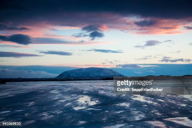 iceland sunrise, myvatn winter landscape - dramatische landschaft stock pictures, royalty-free photos & images