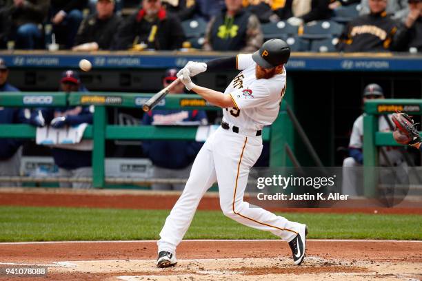 Colin Moran of the Pittsburgh Pirates hits a grand slam home run in the first inning against the Minnesota Twins during inter-league play at PNC Park...