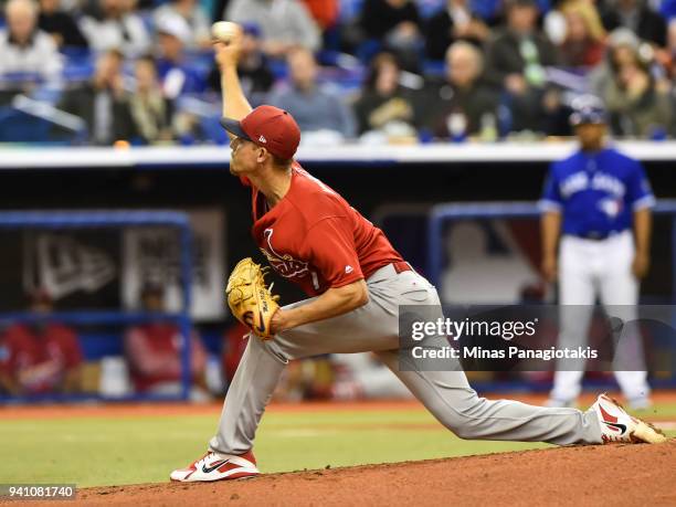 Luke Weaver of the St. Louis Cardinals throws a pitch against the Toronto Blue Jays during the MLB preseason game at Olympic Stadium on March 27,...