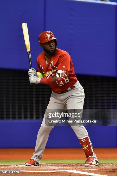 Marcell Ozuna of the St. Louis Cardinals prepares to bat against the Toronto Blue Jays during the MLB preseason game at Olympic Stadium on March 27,...