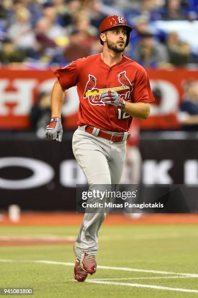 Paul DeJong of the St. Louis Cardinals runs to first base against the Toronto Blue Jays during the MLB preseason game at Olympic Stadium on March 27,...