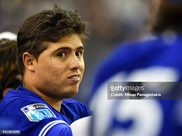 Aledmys Diaz of the Toronto Blue Jays looks on against the St. Louis Cardinals during the MLB preseason game at Olympic Stadium on March 27, 2018 in...
