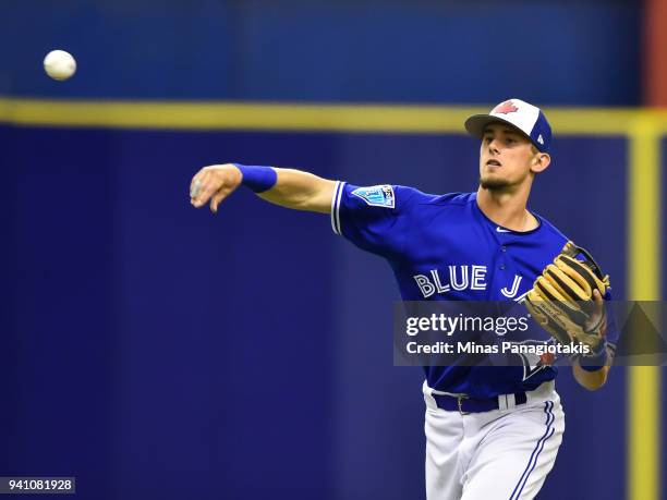 Ryan Borucki of the Toronto Blue Jays throws the ball against the St. Louis Cardinals during the MLB preseason game at Olympic Stadium on March 27,...