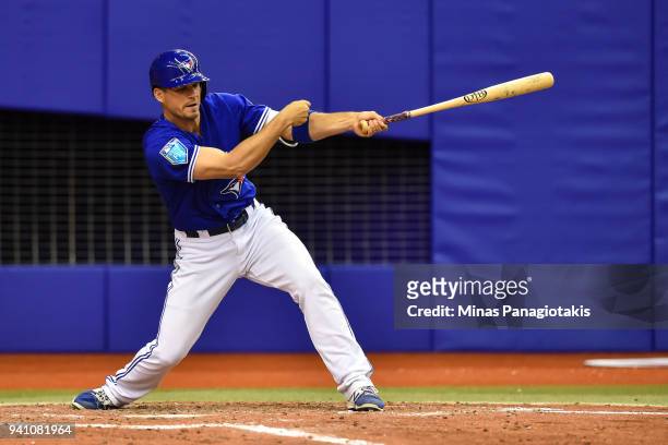 Patrick Cantwell of the Toronto Blue Jays bats against the St. Louis Cardinals during the MLB preseason game at Olympic Stadium on March 27, 2018 in...