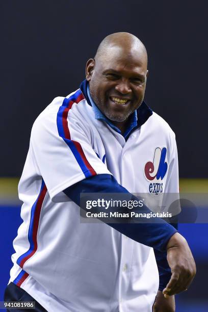 Former left fielder for the Montreal Expos Tim Raines throws the opening pitch during the pregame ceremony between the Toronto Blue Jays and the St....