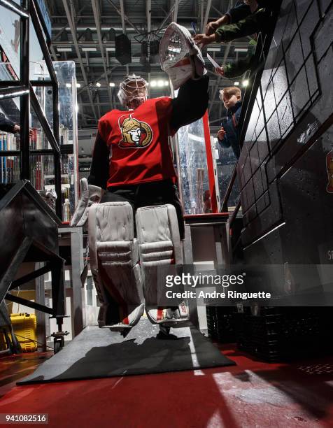 Mike Condon of the Ottawa Senators leaves the ice after warmup prior to a game against the Florida Panthers at Canadian Tire Centre on March 29, 2018...