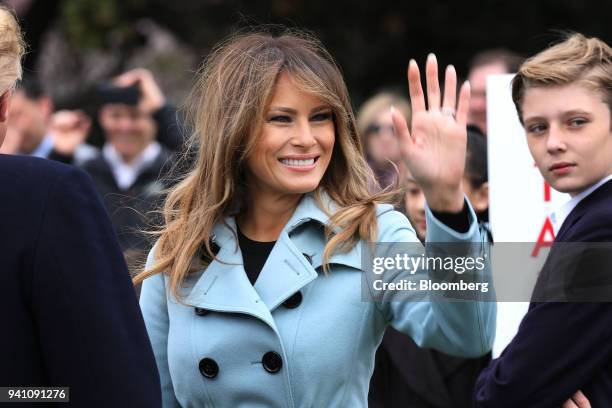 First Lady Melania Trump waves during the Easter Egg Roll on the South Lawn of the White House in Washington, Washington, D.C., U.S., on Monday,...