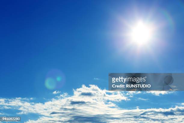 sunny bright blue sky with clouds - soleggiato foto e immagini stock