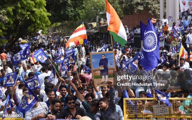 Dalits staging a protest during Bharat Bandh called by several Dalit organisations to protest against a Supreme Court order which allegedly dilutes a...
