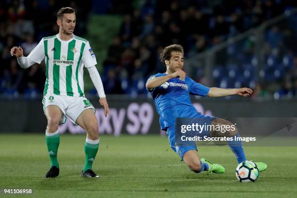 Fabian Ruiz Pena of Real Betis, Mathieu Flamini of Getafe during the La Liga Santander match between Getafe v Real Betis at the Coliseum Alfonso...