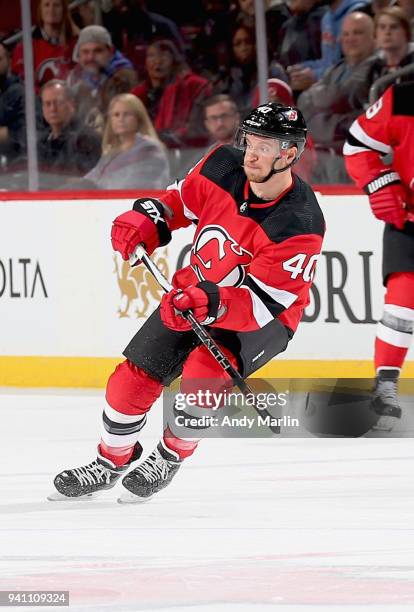 Michael Grabner of the New Jersey Devils skates against the New York Islanders during the game at Prudential Center on March 31, 2018 in Newark, New...