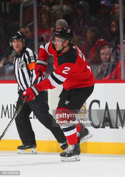 John Moore of the New Jersey Devils skates against the New York Islanders during the game at Prudential Center on March 31, 2018 in Newark, New...
