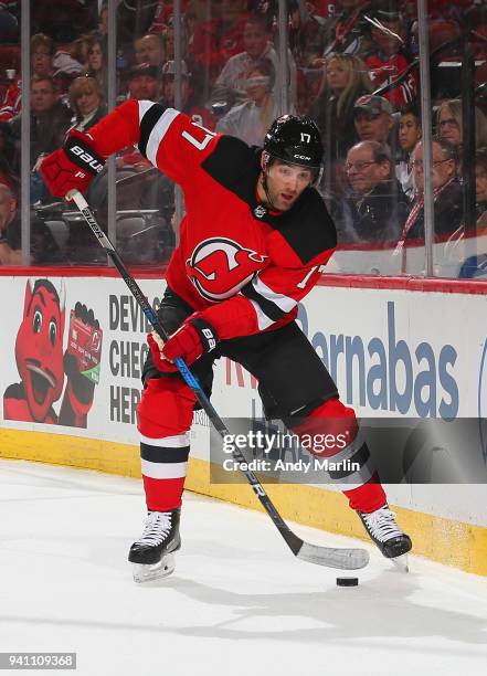 Patrick Maroon of the New Jersey Devils plays the puck during the game against the New York Islanders at Prudential Center on March 31, 2018 in...