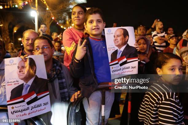 Supporters of President Abdel-Fattah el-Sissi celebrate in Abdin Square in Cairo, Egypt on 2 April 2018, after the election commission announced the...