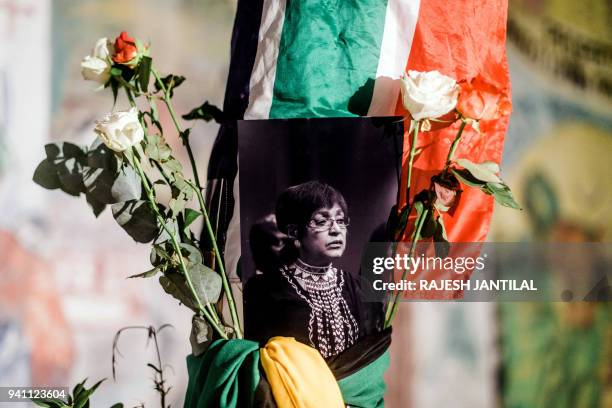 Black and white photograph of the late South African anti-apartheid campaigner Winnie Madikizela-Mandela, ex-wife of former South African president...