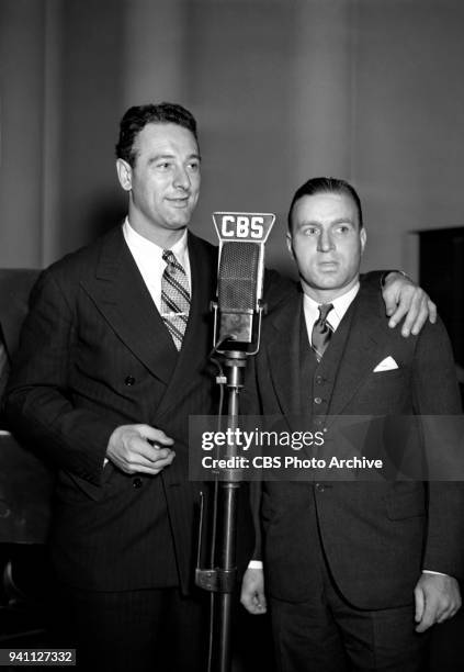 New York Yankees baseball legend Lou Gehrig poses for a photo with John Clipper Smith, head football coach at Duquesne University on the Kate Smith...