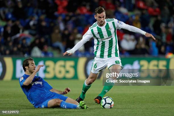 Mathieu Flamini of Getafe, Fabian Ruiz Pena of Real Betis during the La Liga Santander match between Getafe v Real Betis at the Coliseum Alfonso...