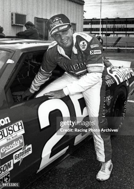 Rick Hendrick climbs into his Chevy in 1987. Rick finished 33rd after blowing a transmission on lap 75 during the Winston West 500. Rick Hendrick