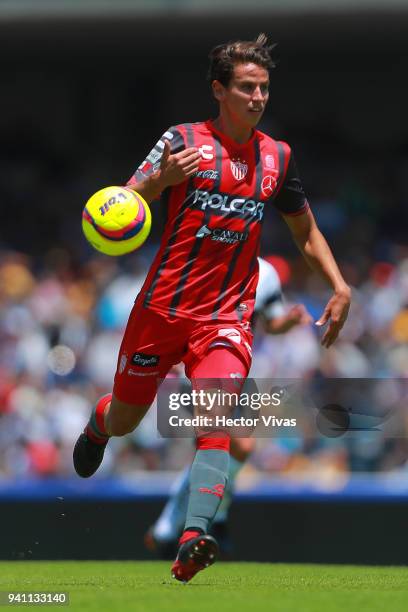 Igor Lichnovsky of Necaxa drives the ball during the 13th round match between Pumas UNAM and Necaxa as part of the Torneo Clausura 2018 Liga MX at...