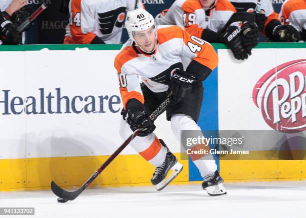 Jordan Weal of the Philadelphia Flyers handles the puck against the Dallas Stars at the American Airlines Center on March 27, 2018 in Dallas, Texas....