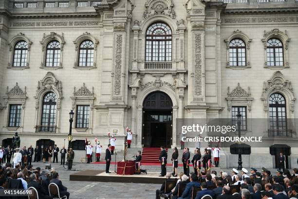 General view of Peruvian President Martin Vizcarra swearing in his eighteen new ministers during a ceremony at the main courtyard of the Palace of...