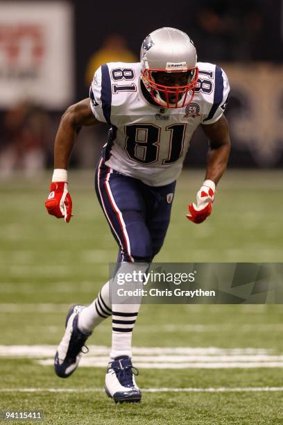 Randy Moss of the New England Patriots runs during the game against the New Orleans Saints at the Louisiana Superdome on November 30, 2009 in New...