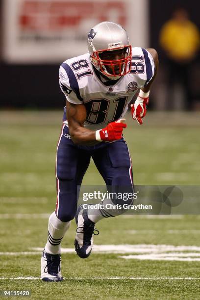 Randy Moss of the New England Patriots runs during the game against the New Orleans Saints at the Louisiana Superdome on November 30, 2009 in New...