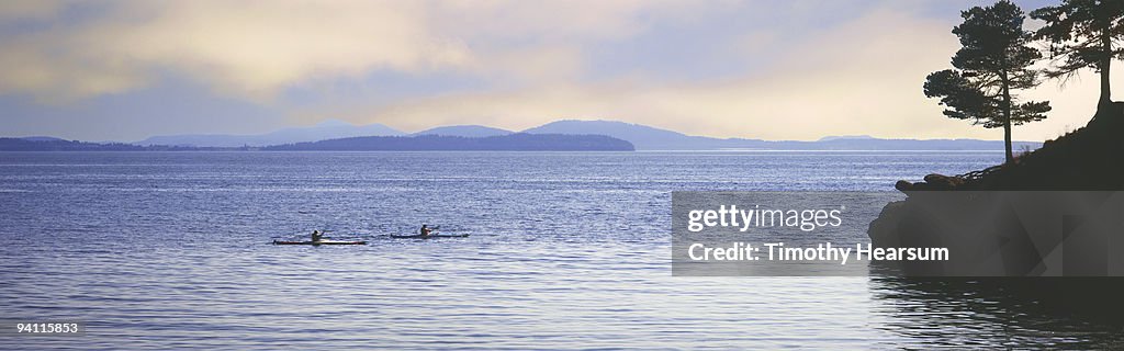 Ocean kayakers with islands in background