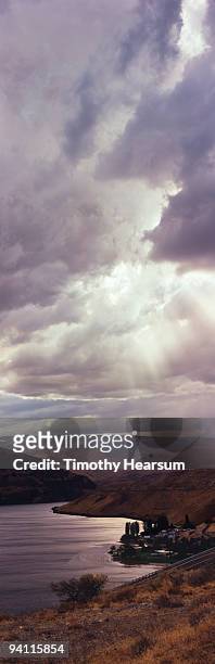 storm clouds over river gorge - timothy hearsum stockfoto's en -beelden