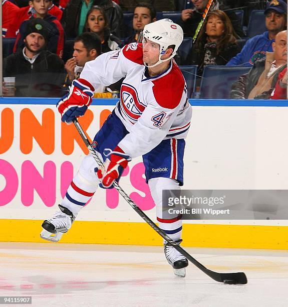 Marc-Andre Bergeron of the Montreal Canadiens passes the puck against the Buffalo Sabres on December 3, 2009 at HSBC Arena in Buffalo, New York.