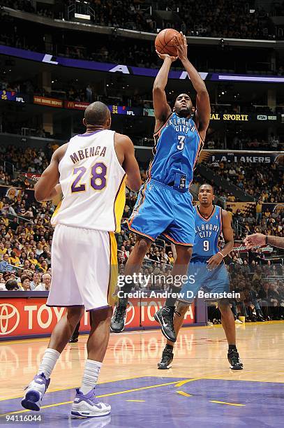 White of the Oklahoma City Thunder shoots the ball over Didier Ilunga-Mbenga of the Los Angeles Lakers during the game on November 22, 2009 at...